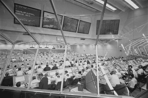 Engineers_Working_in_the_Launch_Control_Center_Preparing_for_the_Launch_of_Apollo_11.gif