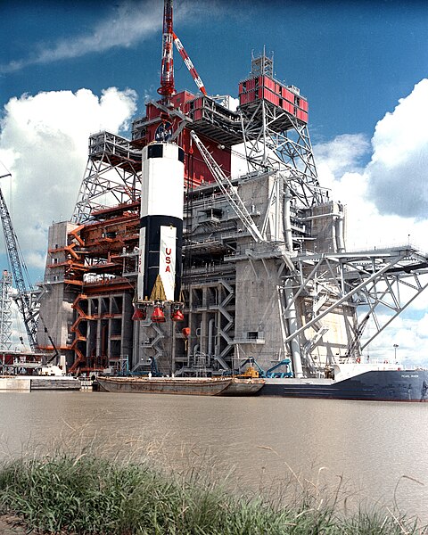 480px-Saturn_V_First_Stage_Lifted_into_Test_Stand._-_GPN-2000-000559.jpg