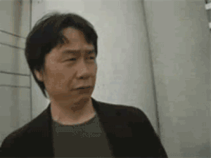 Shigeru-Miyamoto-Suspicious-Expression-As-He-Backs-Away.gif