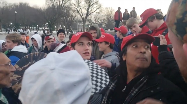 hate-hoax-maga-hat-students-dc.jpg